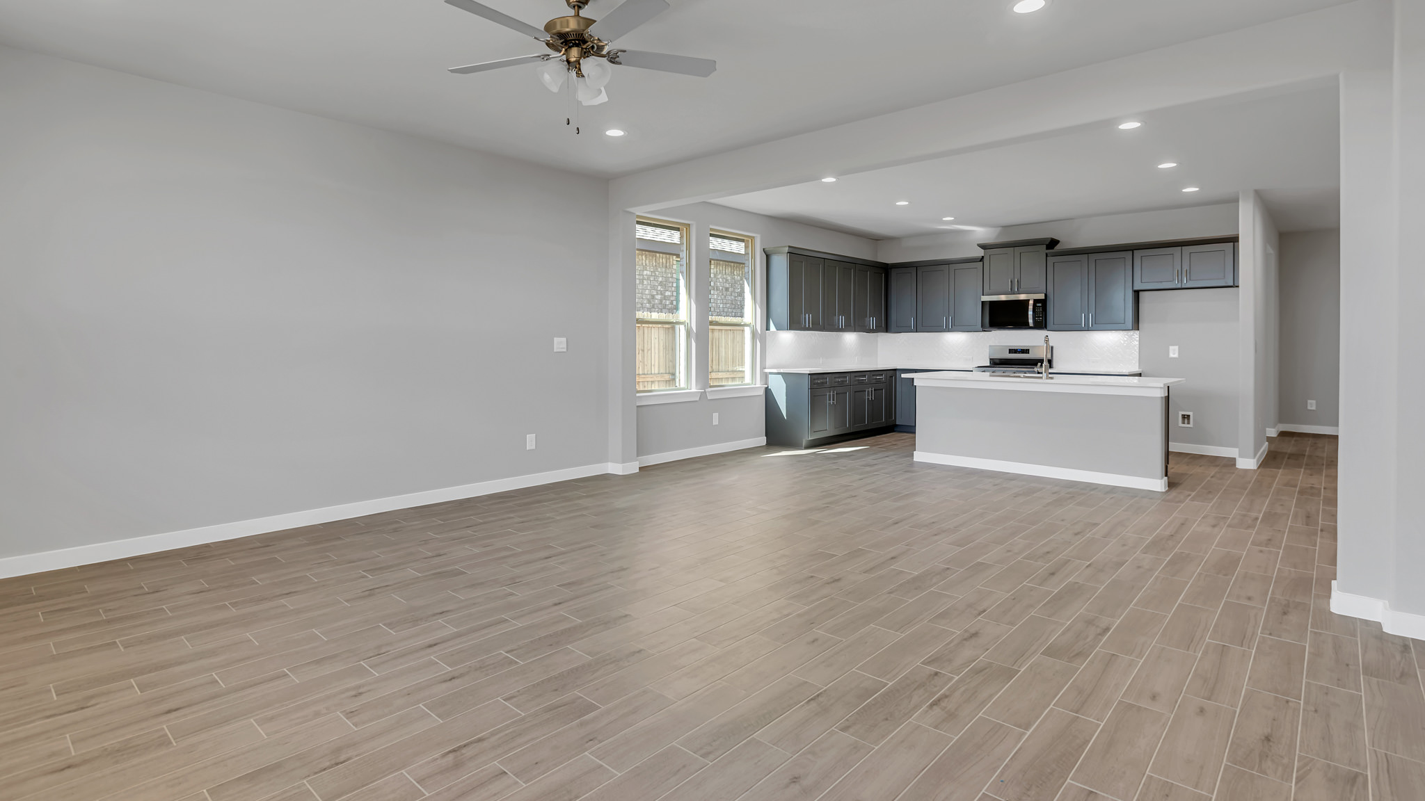 Open concept kitchen, living, family, and dining room space