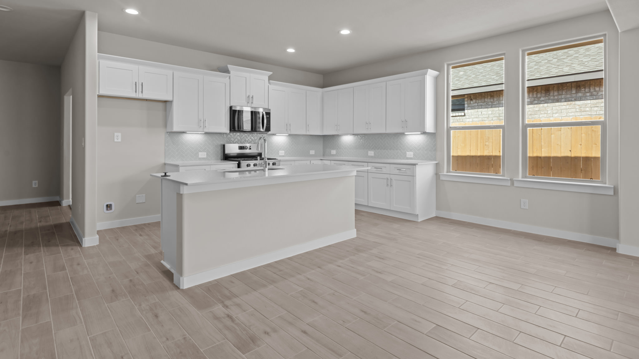 Spacious open kitchen with ample natural light