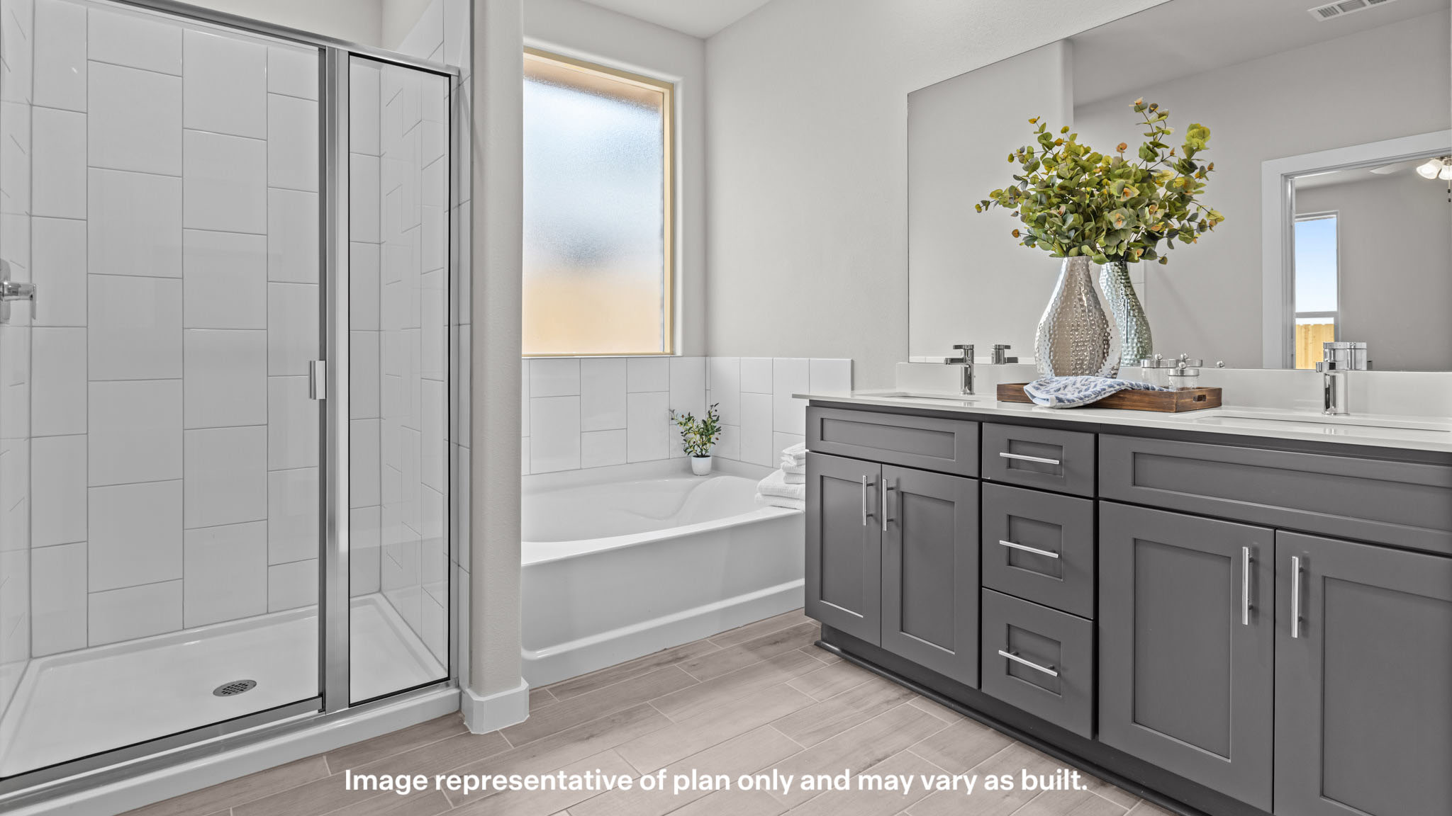 Primary bathroom with luxurious shower and built in storage