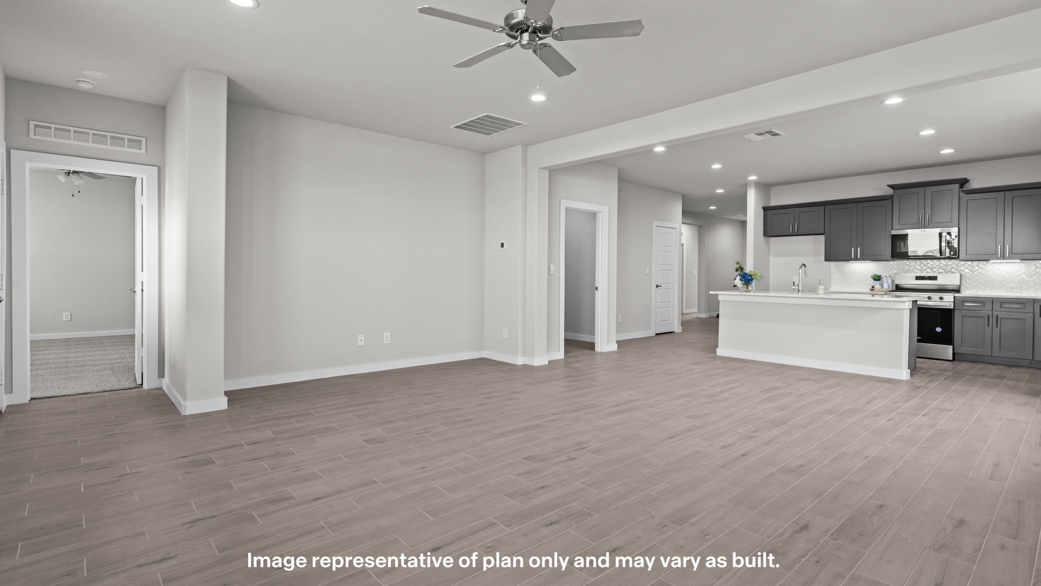 Open concept kitchen, living, family, and dining room space