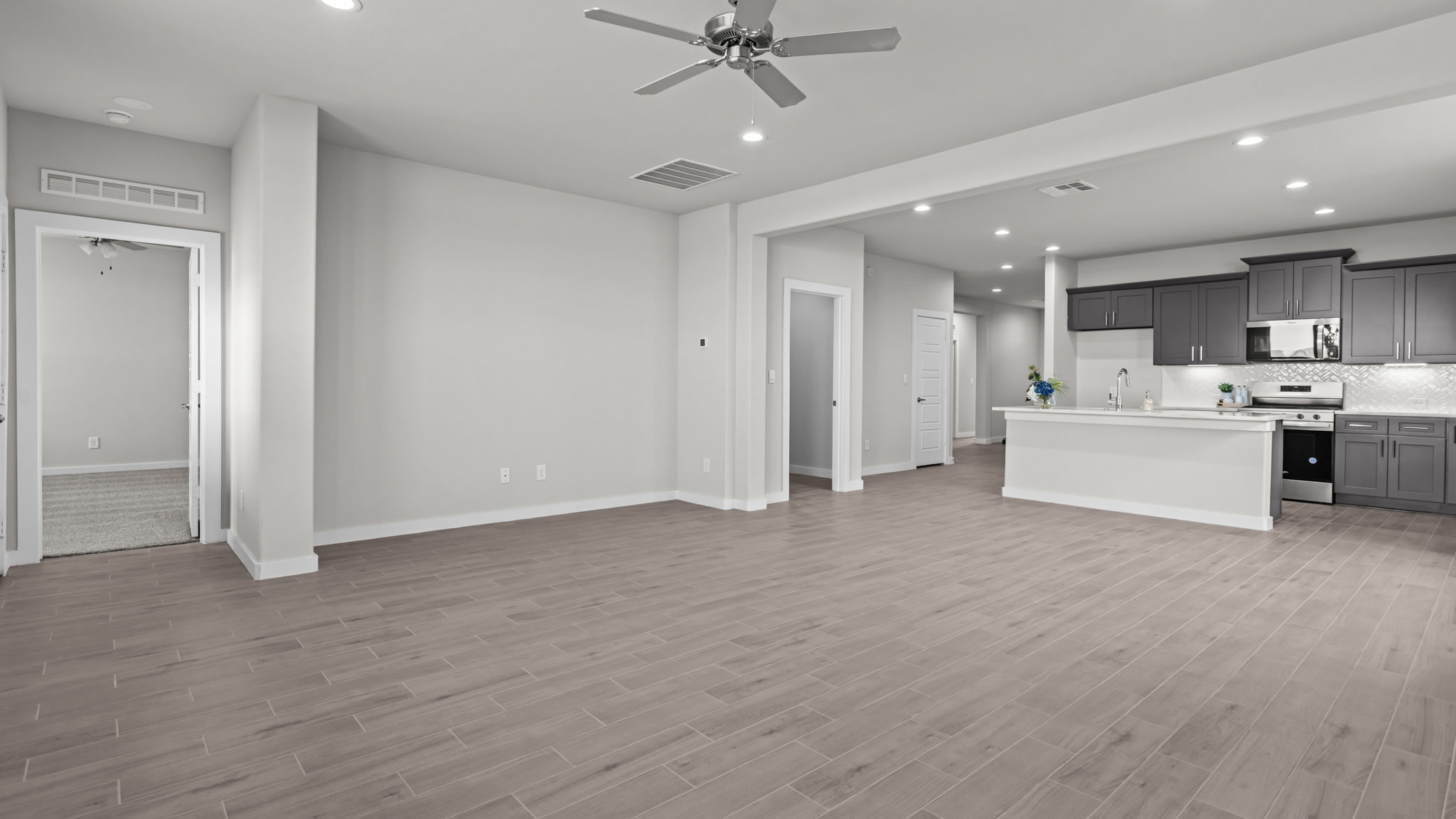 Open concept kitchen, living, family, and dining room space