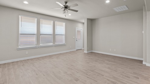 Open concept living and family area with lvp flooring