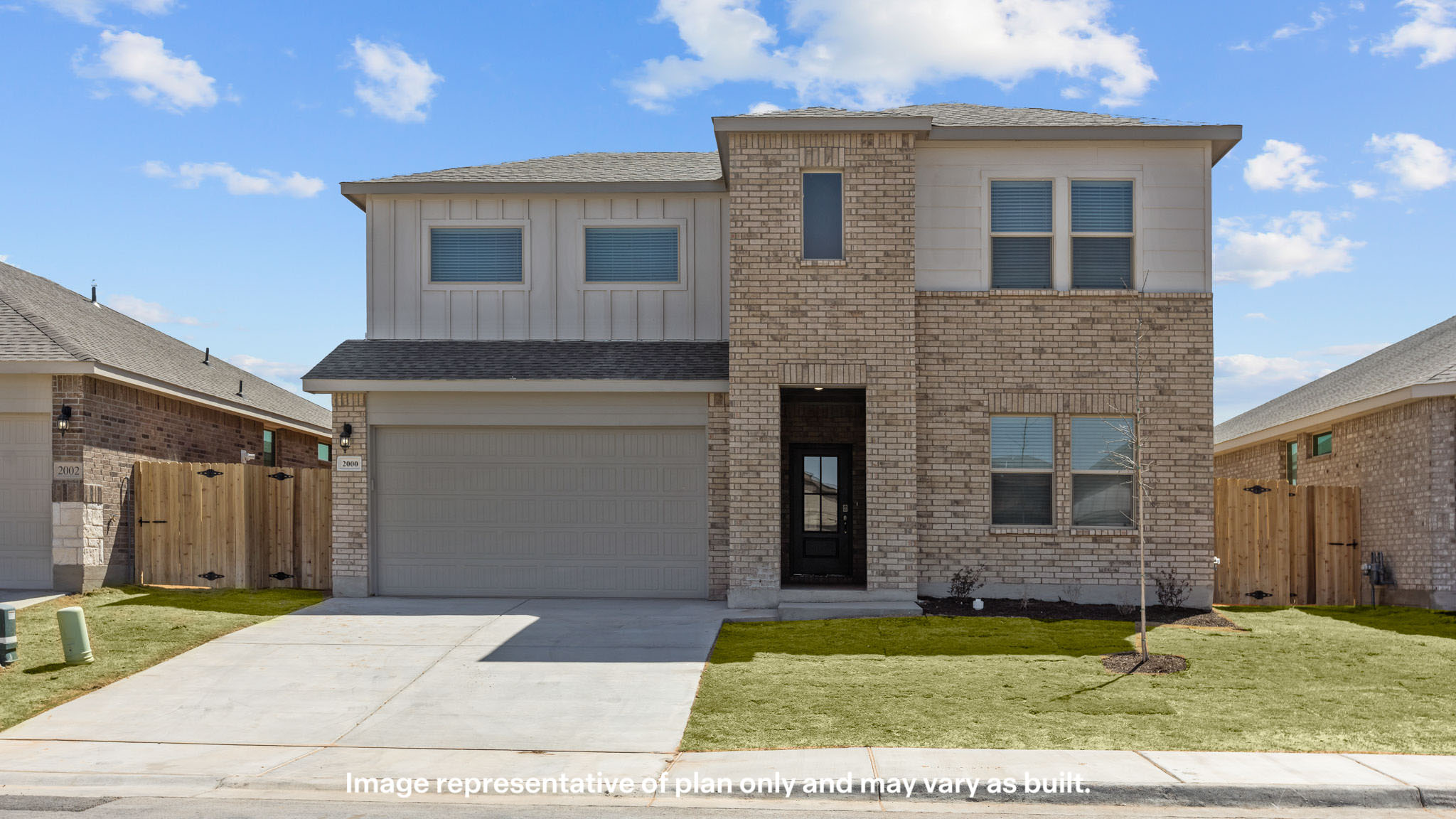 Exterior of two story stylish farmhouse home