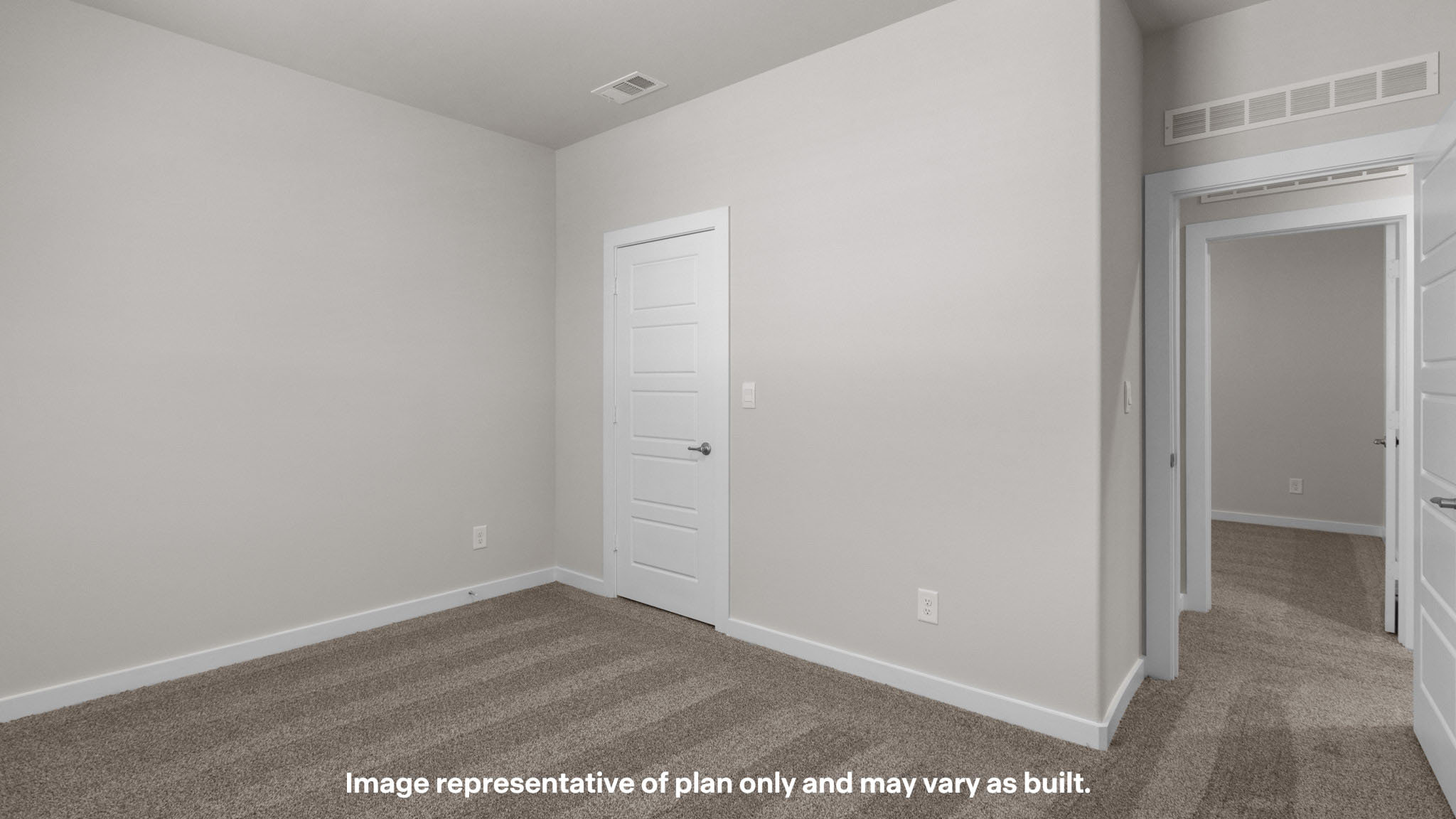Upstairs guest bedroom 2 with plush carpet floors