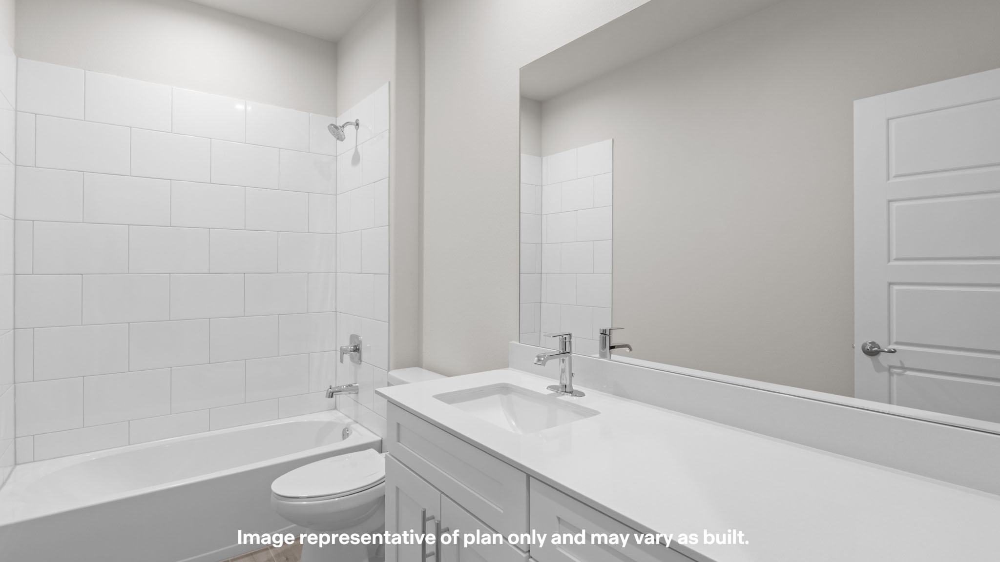 Upstairs guest bathroom with combination shower and bathtub