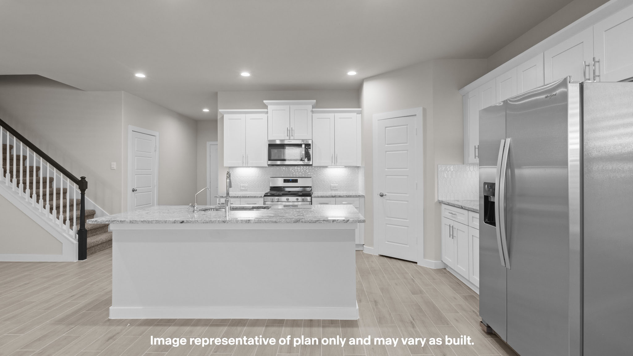 Spacious open kitchen overlooking family and living space