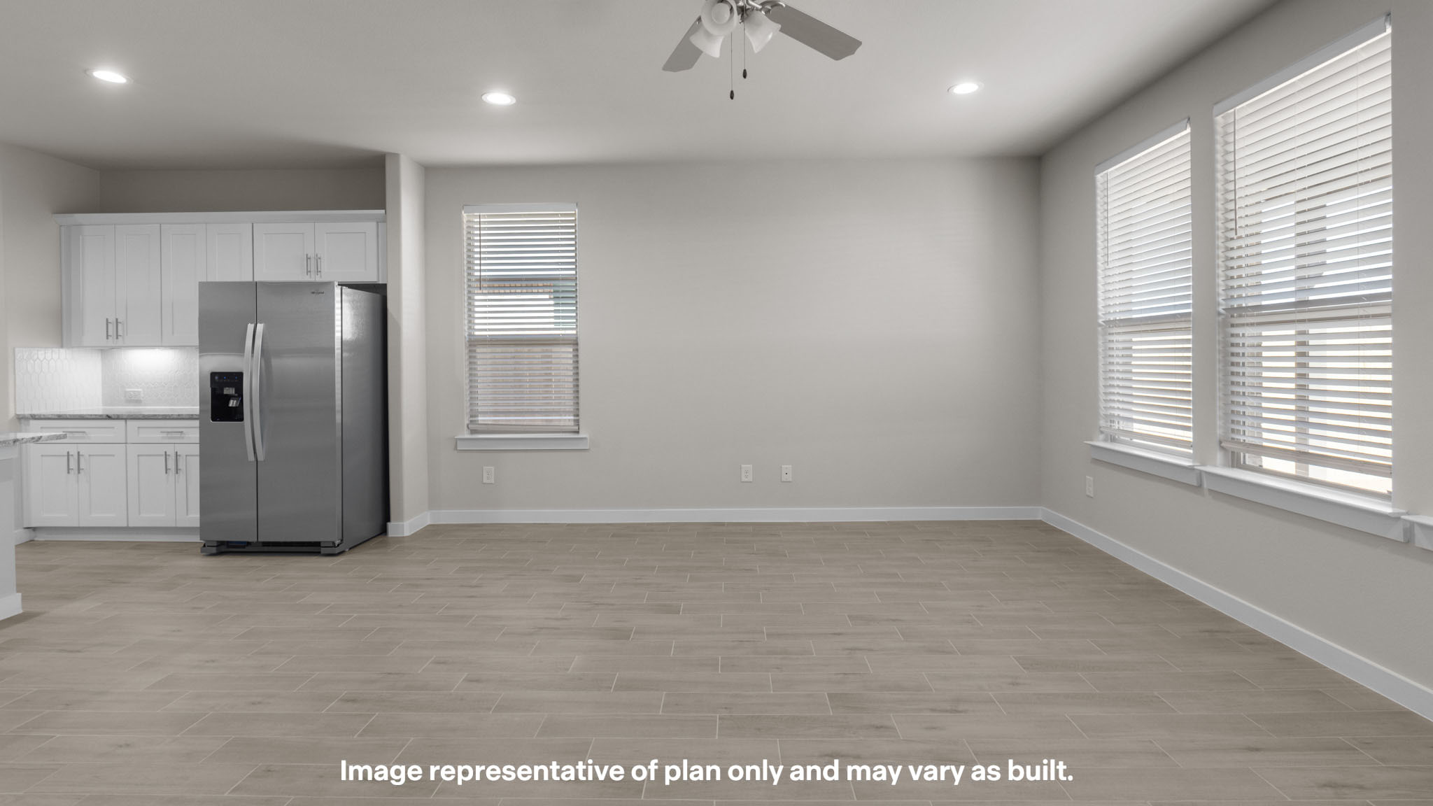 Cozy dining nook space to the side of the kitchen overlooking backyard