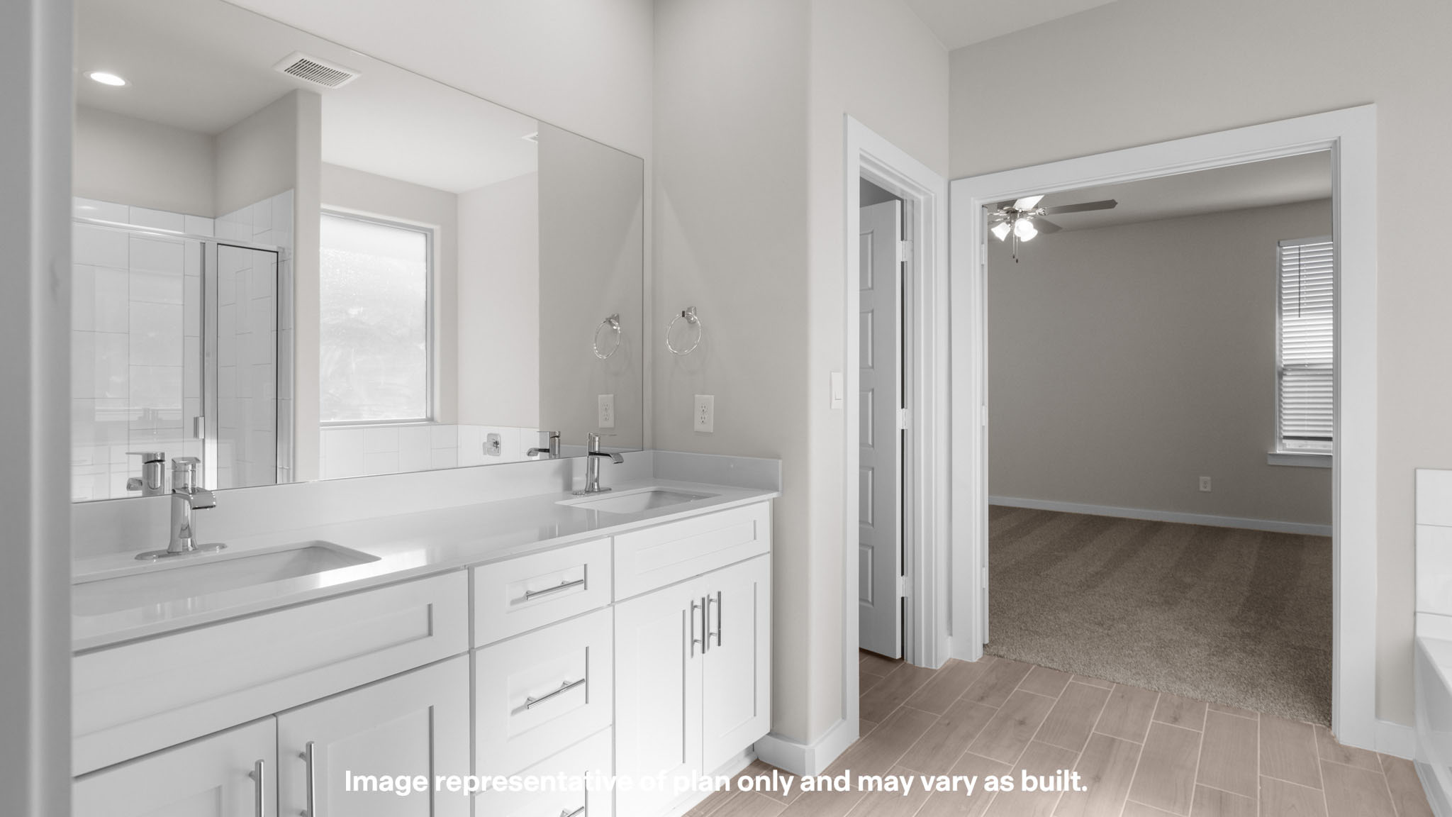 Primary bathroom with luxurious shower and built in storage