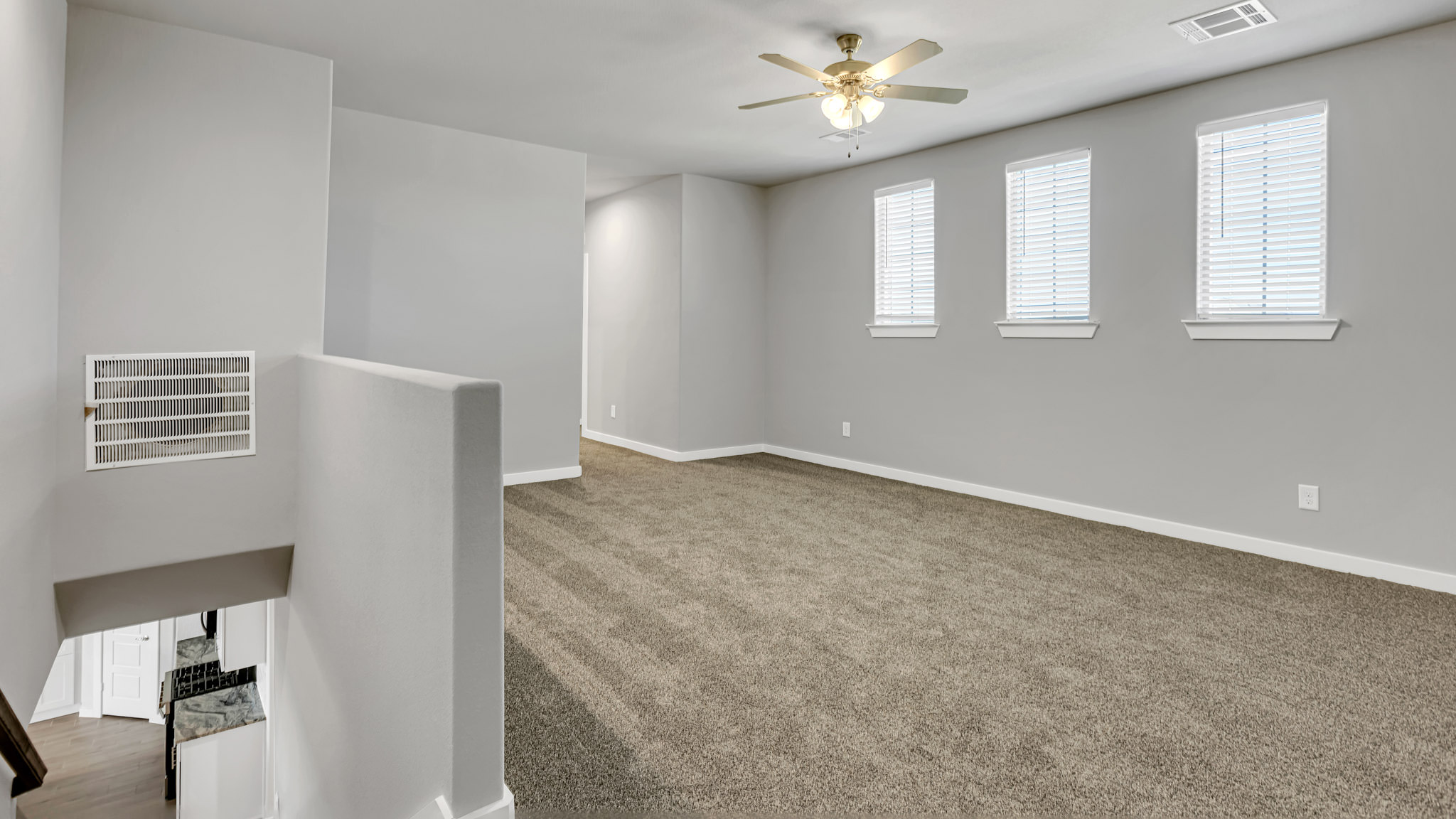 Upstairs landing space perfect for a game room or entertainment spot