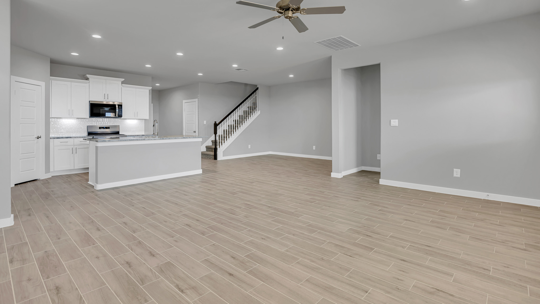 Open concept living, family, dining, and kitchen space