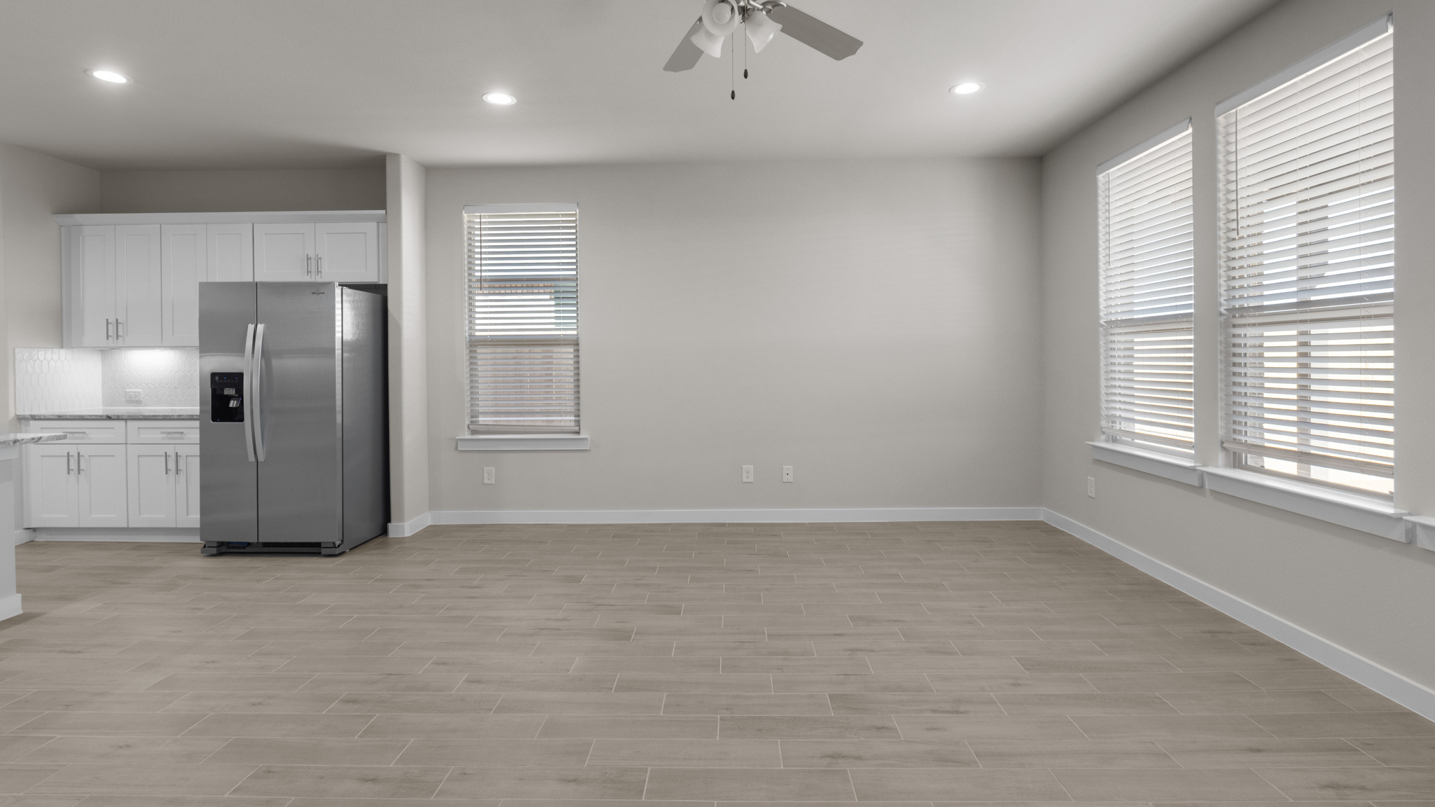 Living and family room area complete with durable lvp flooring