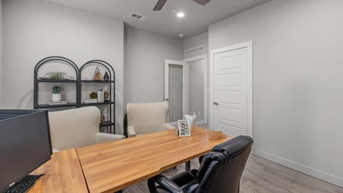 Guest bedroom 3 designed as an office with calming pale neautral tones
