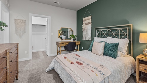 Teen girl bedroom decorated with modern boho trendy warm design