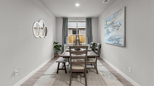 Separate formal dining space adjacent to foyer entry and hallway