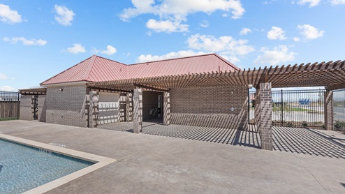Outdoor community clubhouse area with covered awning patio area