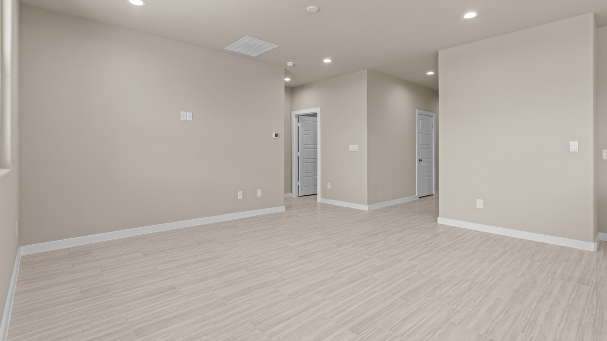 Open concept kitchen, living, family, and dining room space