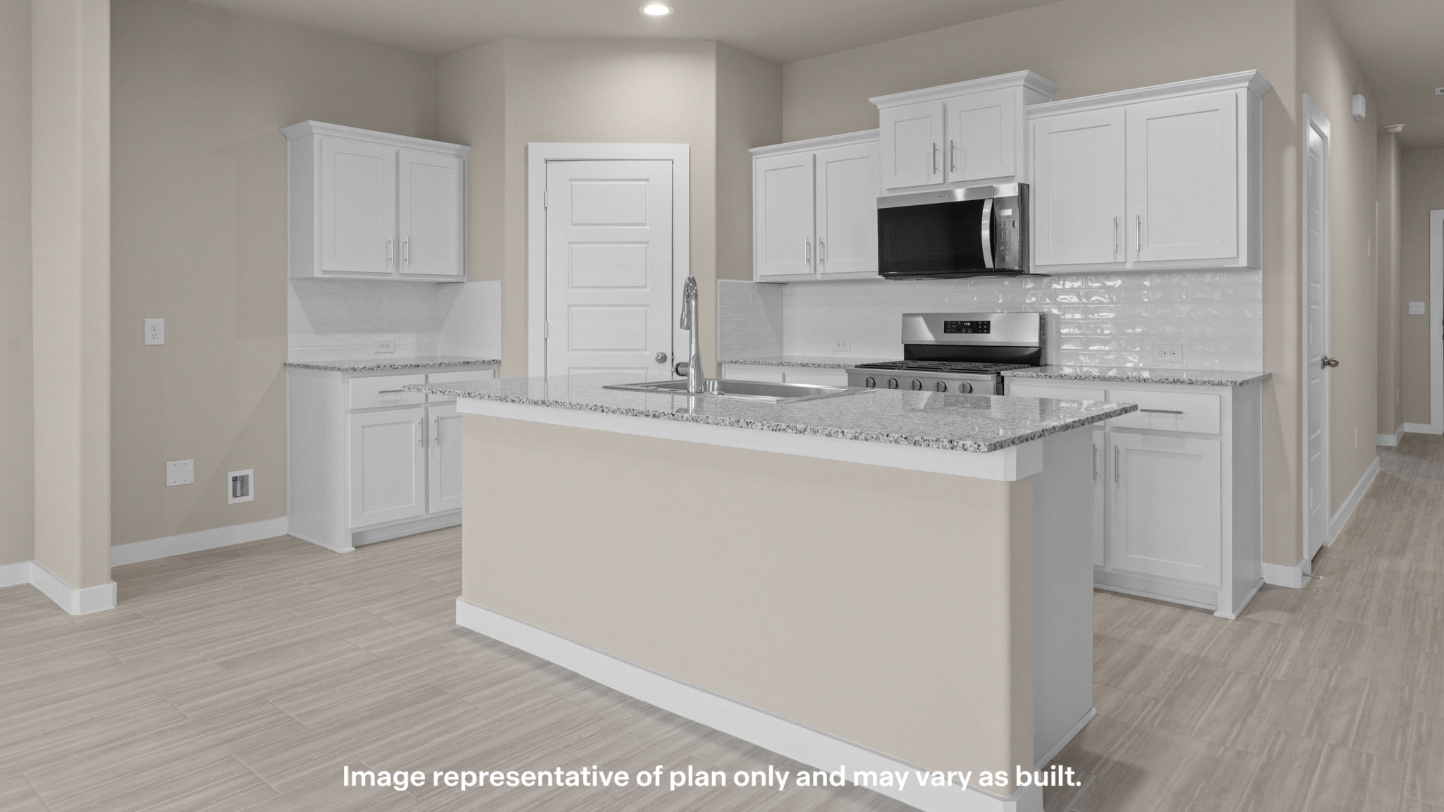 Open concept kitchen with stainless steel appliances, shaker style cabinets, and elevated finishes