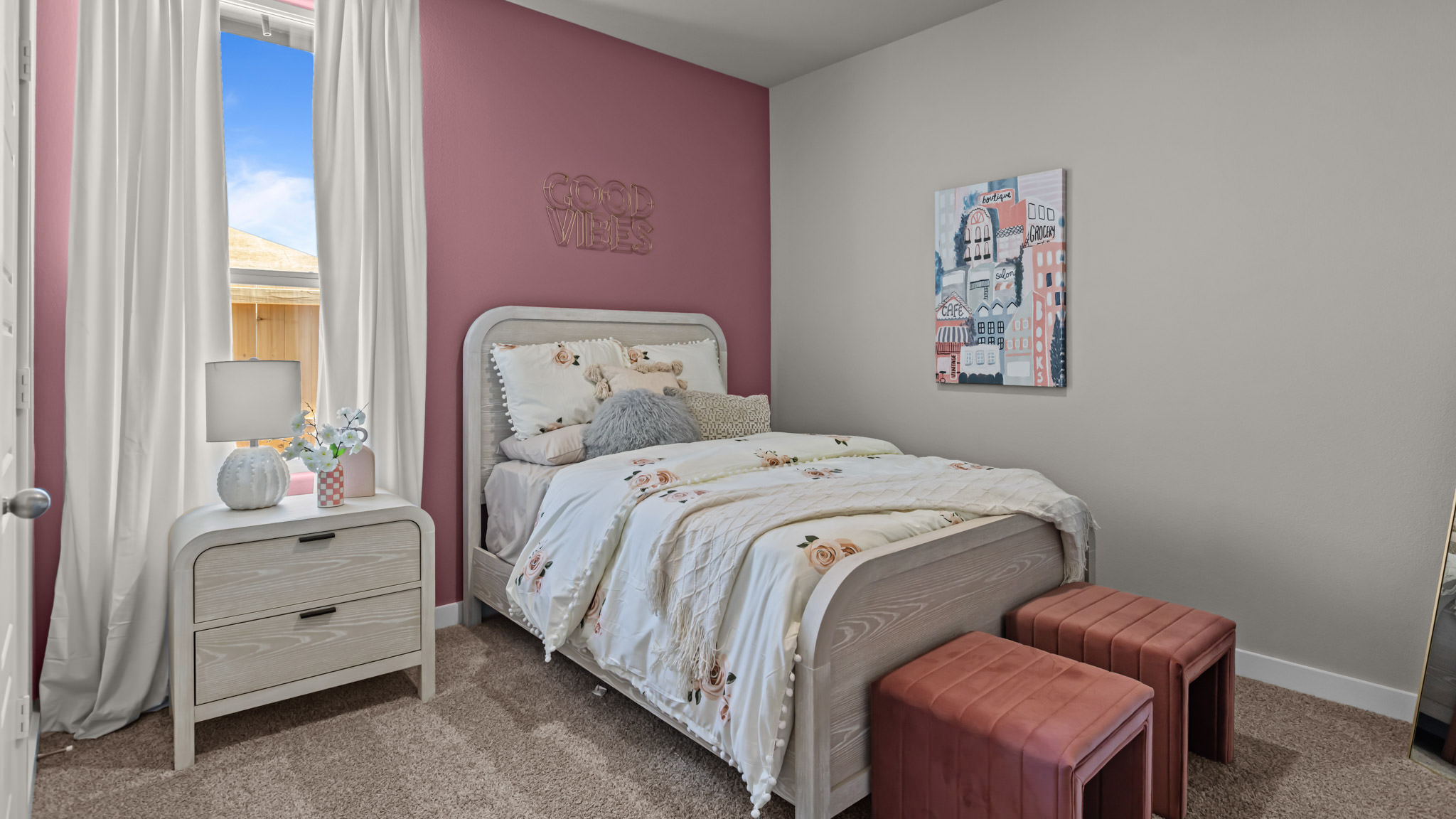 Guest bedroom 2 with side window and plush carpet floor