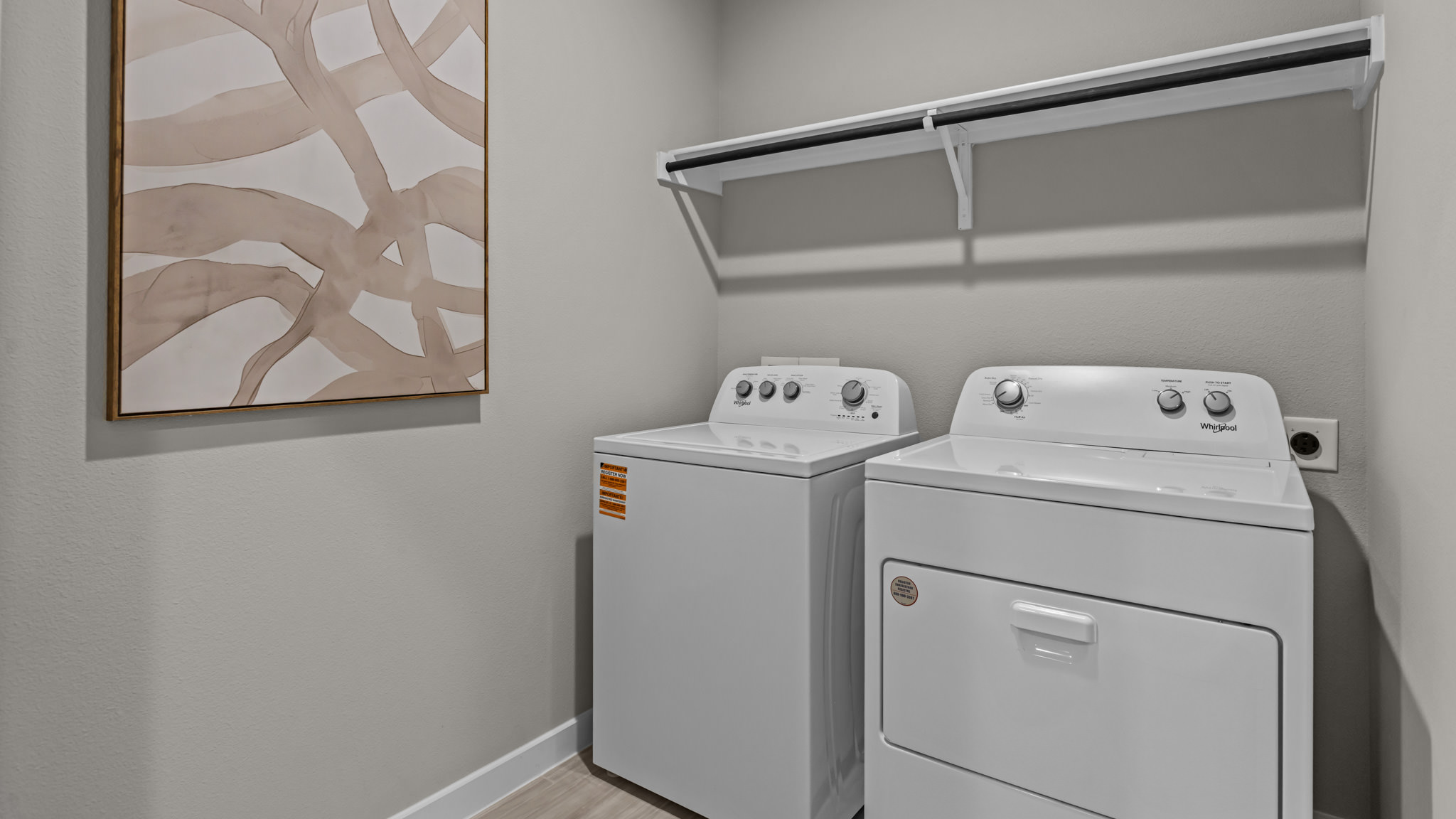 Laundry room and utility closet space with extra storage