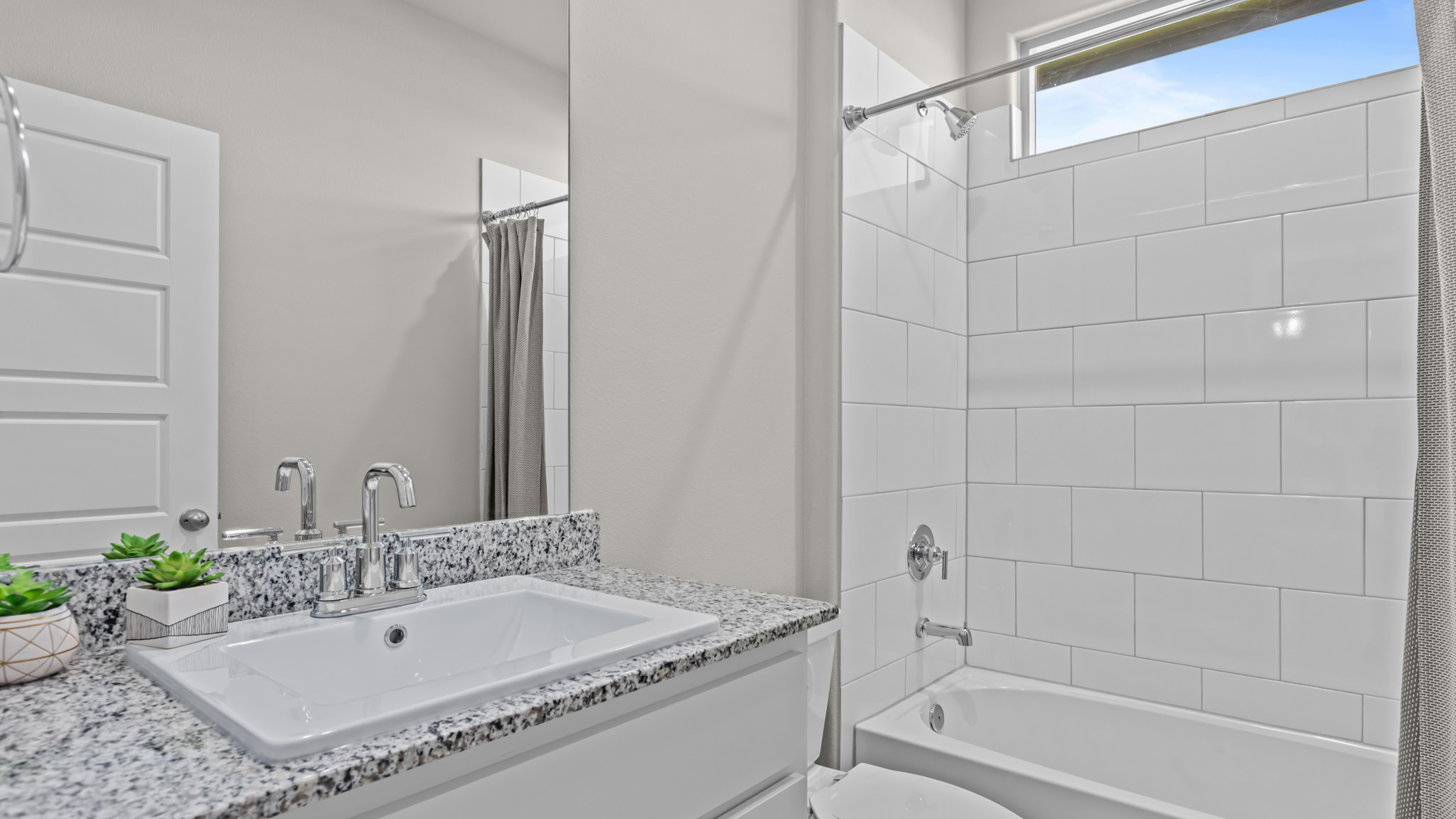 Guest bathroom 2 with built in vanity and combination bathtub shower