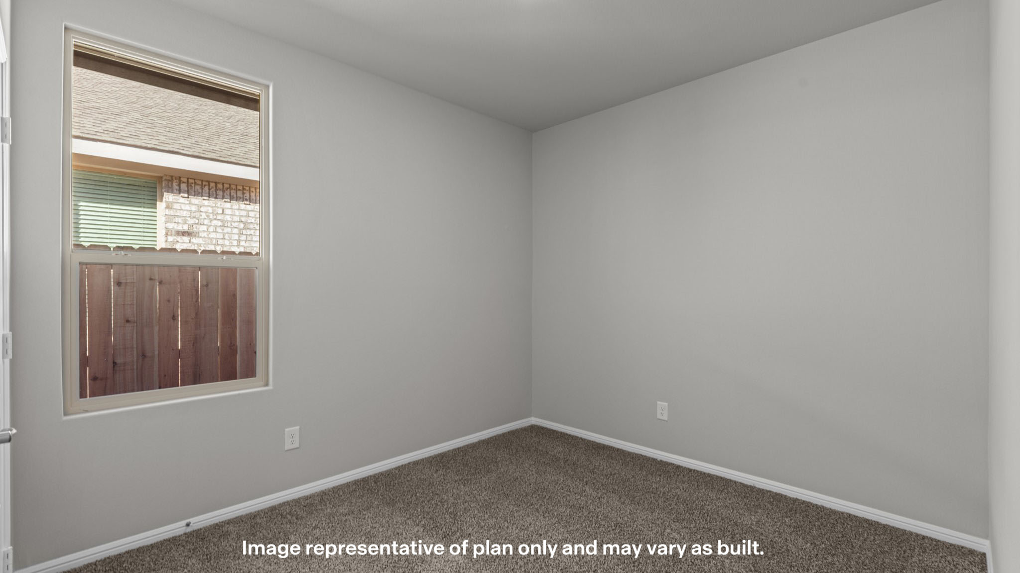 Guest bedroom 2 with side window and plush carpet floor