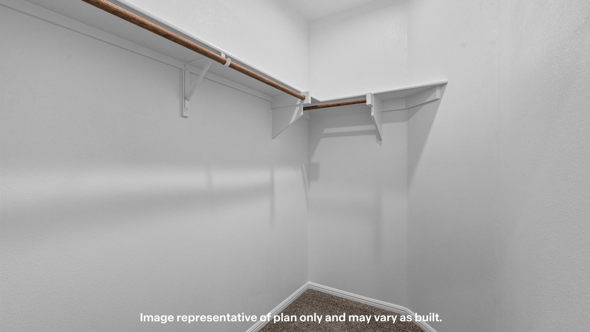 Primary walk-in closet with extra storage space