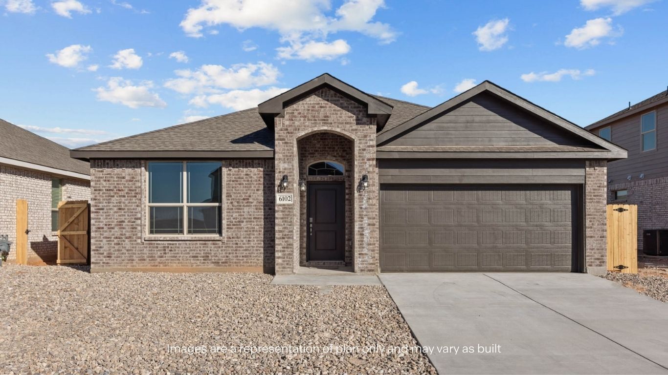 Single story classic brick home with front entry