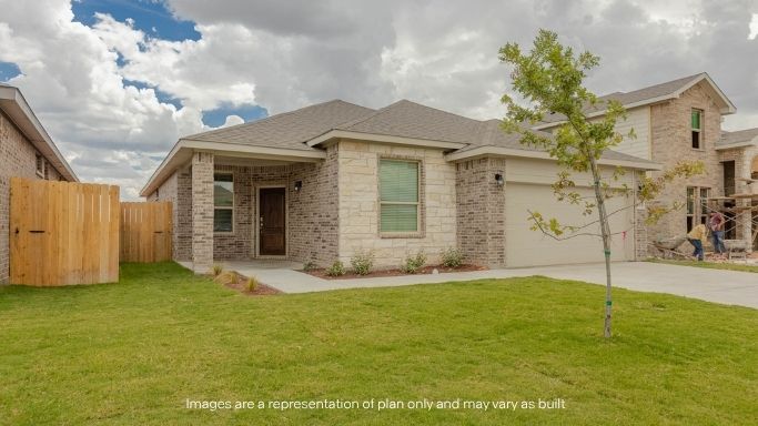 Side view of single story timeless brick home
