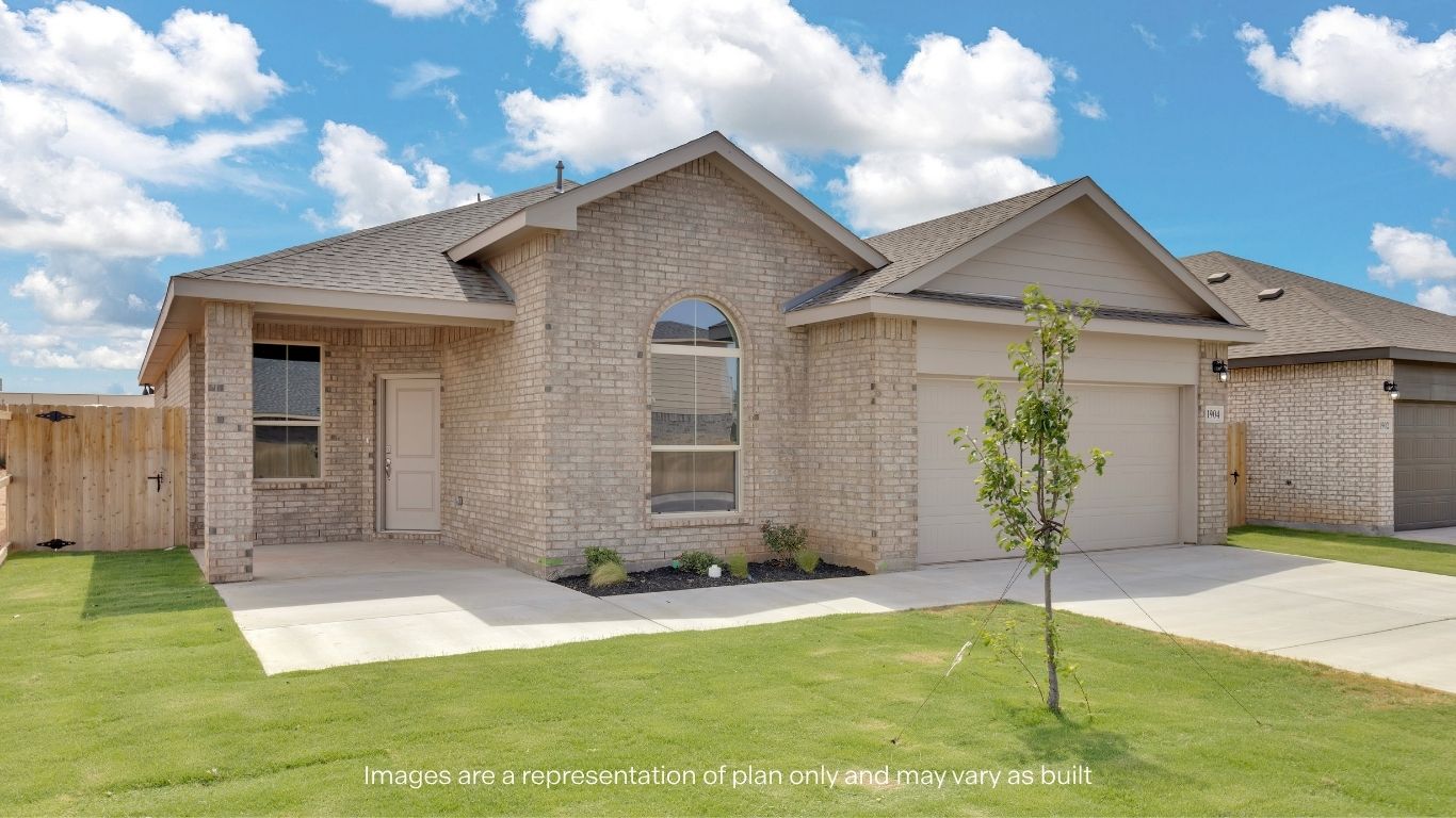 Charming curb appeal with a covered front porch and two-car garage.