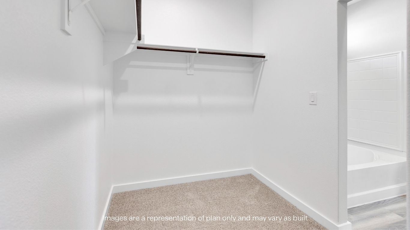 Enjoy a large walk-in closet conveniently connected to the primary bath.
