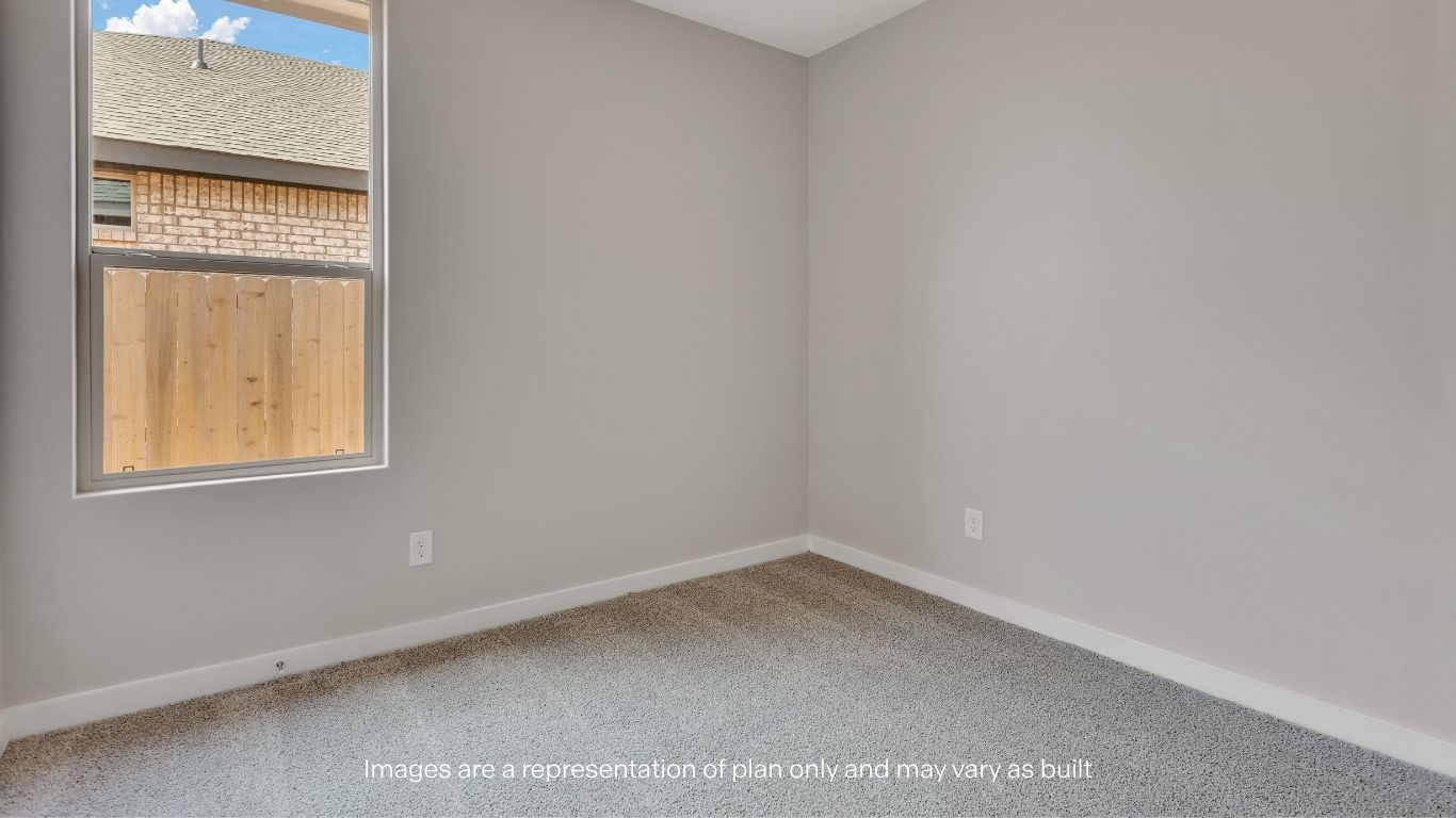 Natural light fills this versatile bedroom space.