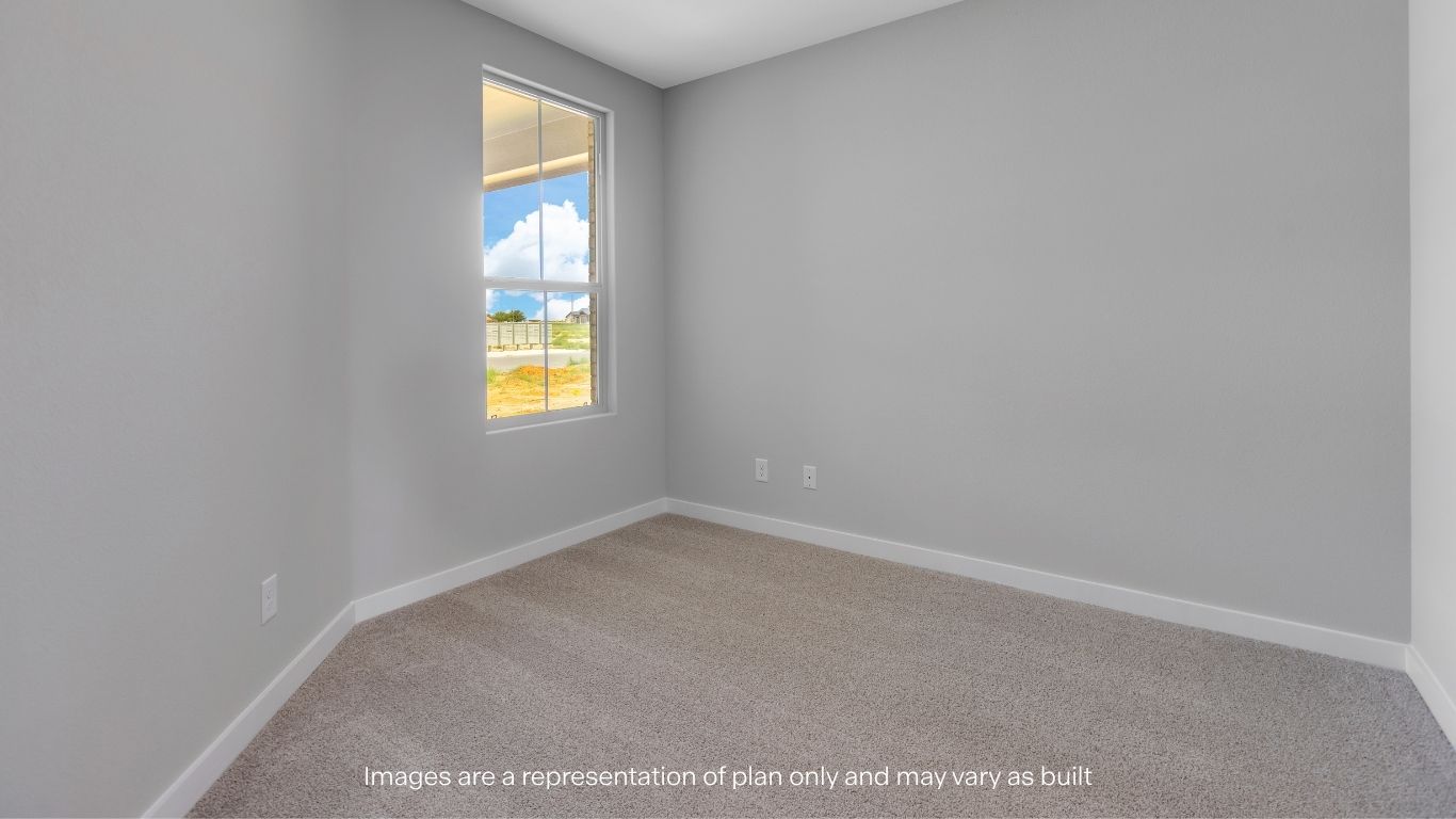 A spacious secondary bedroom ready to fit your needs.