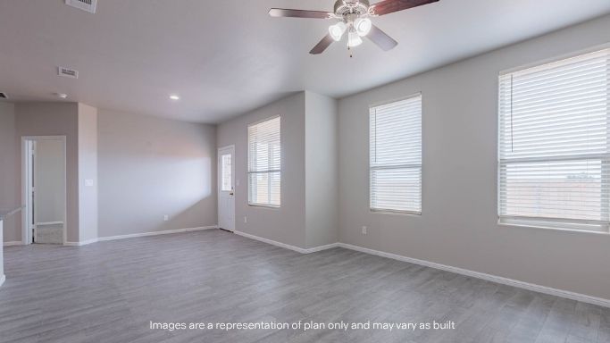 Open living and family room area with ample natural light