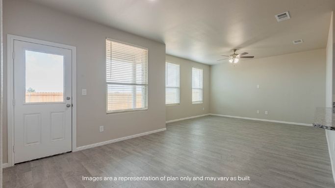 Open living and family room area with ample natural light