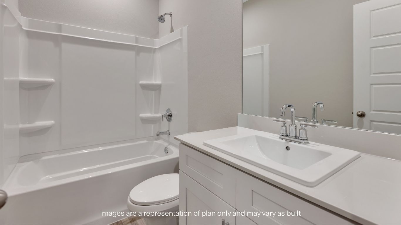 Convenient laundry room with plenty of extra storage space.