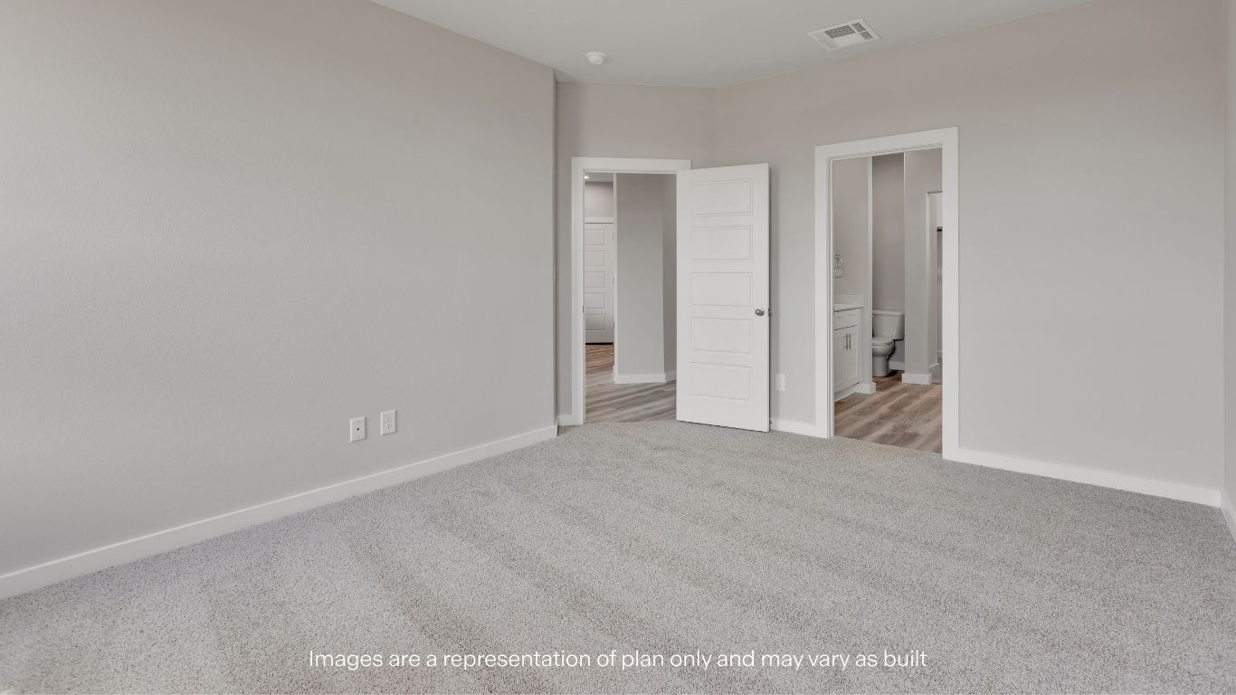 The private primary suite provides a peaceful retreat at the end of the day.