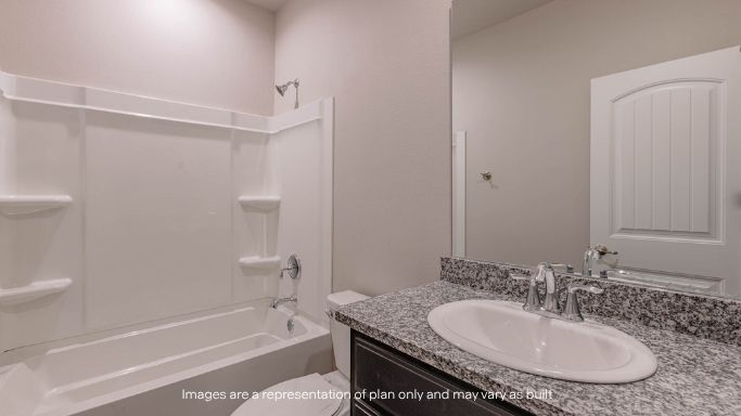 Guest bathroom with built in vanity and combination bathtub shower