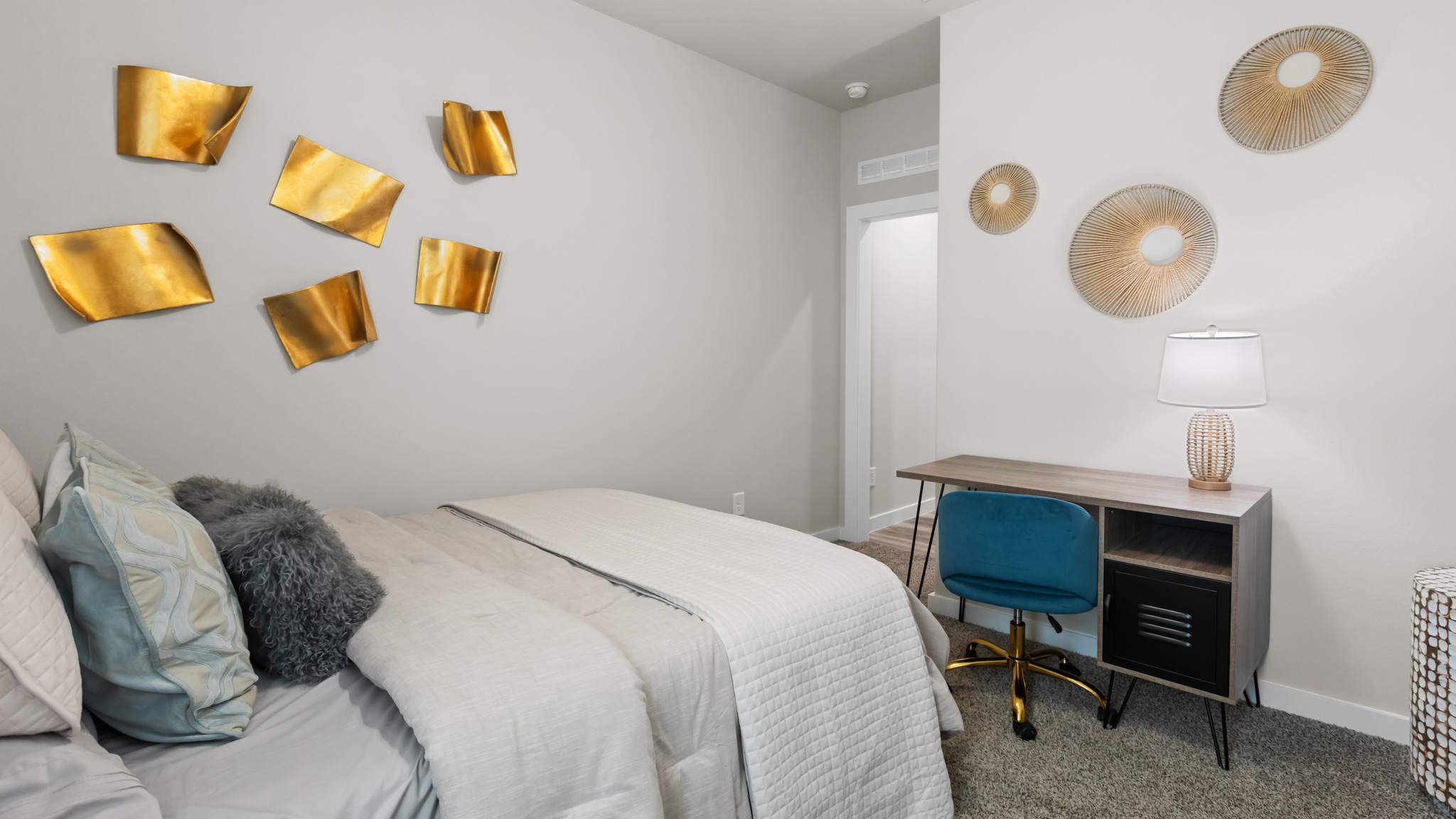 Guest bedroom 1 with side windows and ample natural light