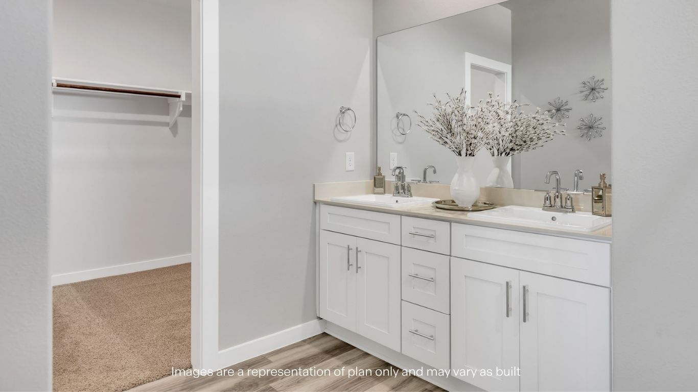 Private attached primary bathroom with built in vanity