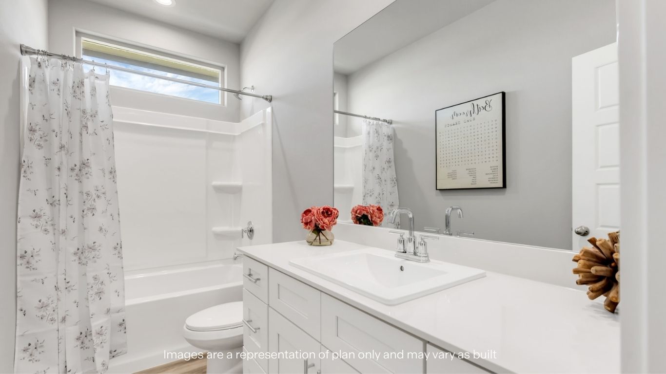 Guest bathroom with built in vanity and combination bathtub shower