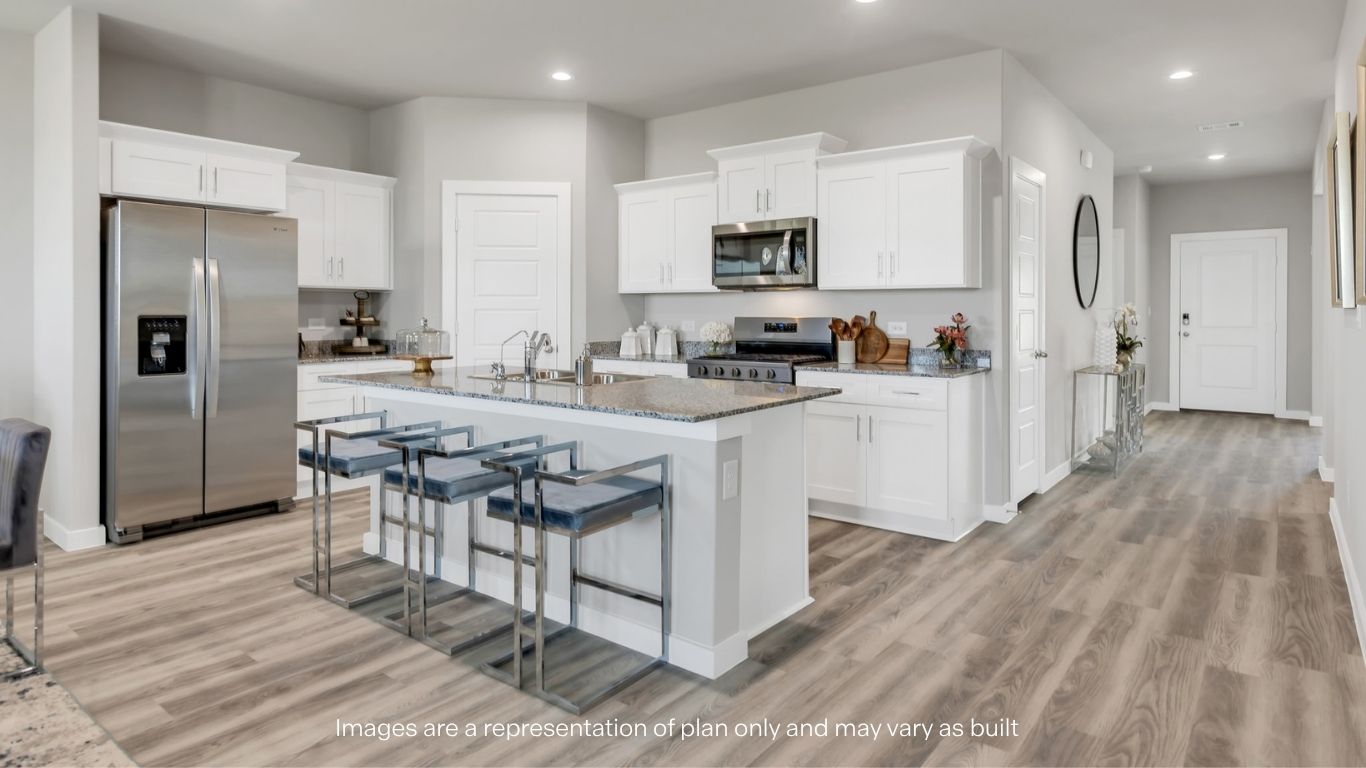 Spacious open concept kitchen with island and counter prep space