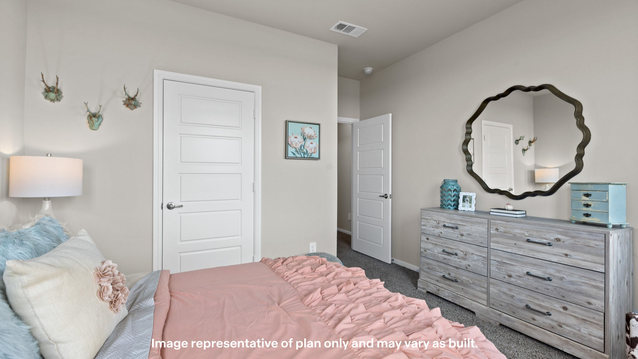 Guest bedroom 1 with front windows and ample natural light