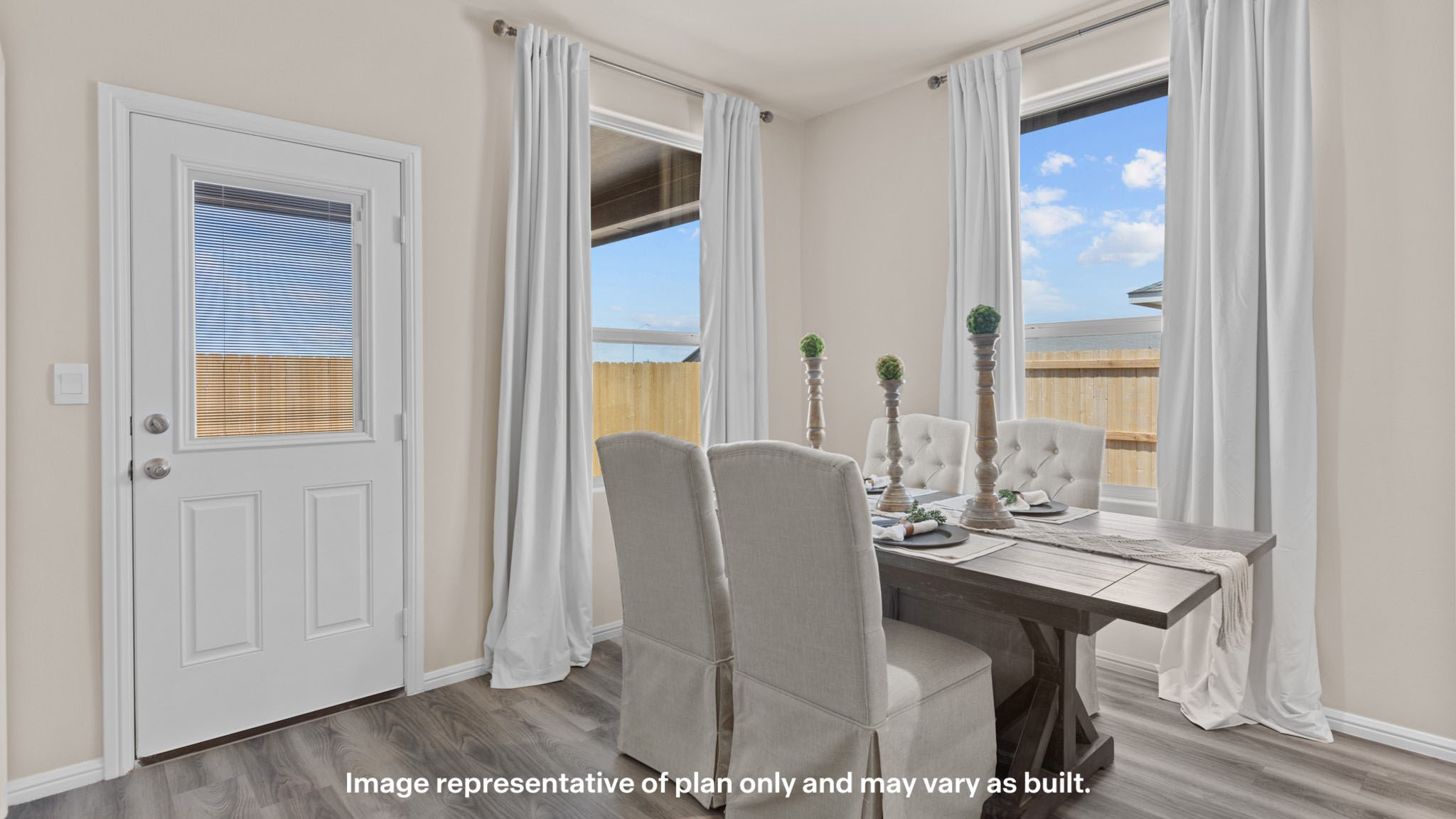 Open dining room space adjacent to kitchen
