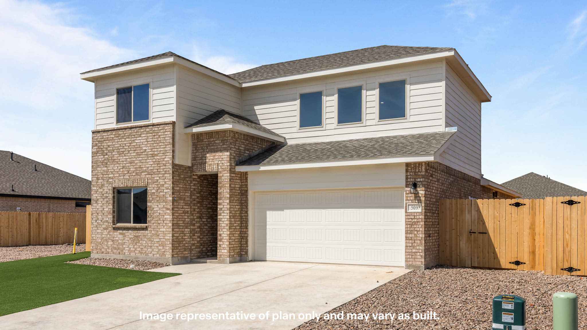 Side view of two story timeless brick home