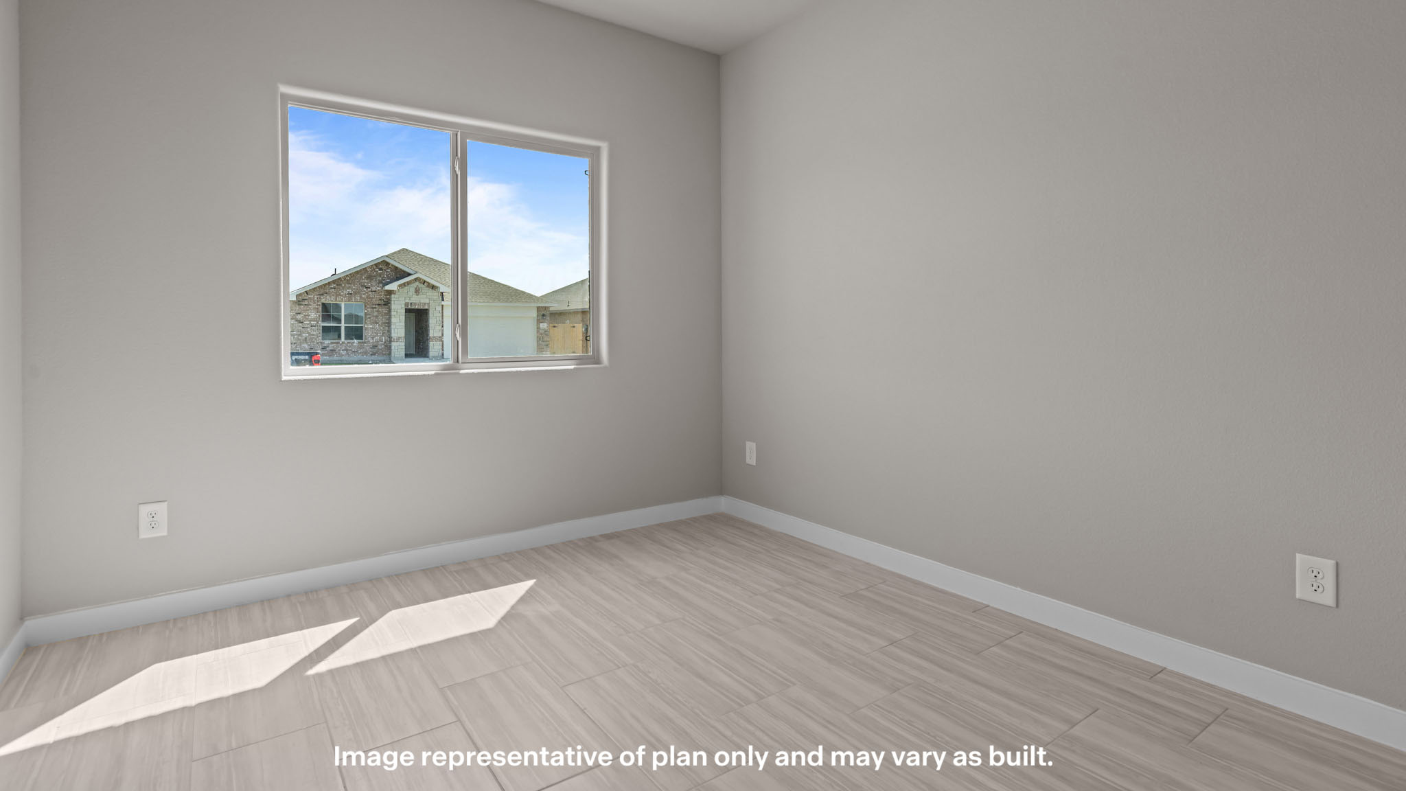 Upstairs guest bedroom 1 with plush carpet floors