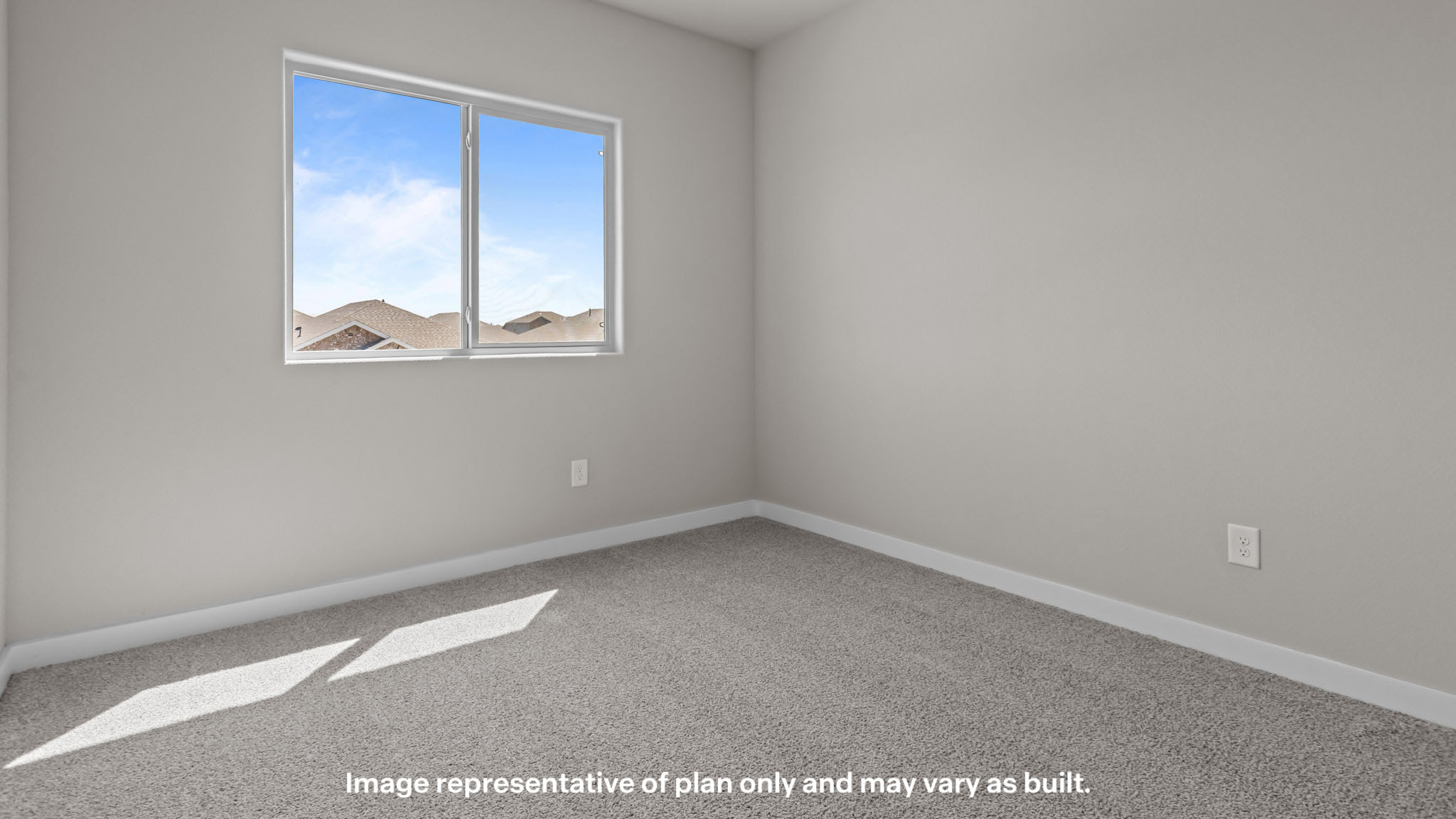 Upstairs guest bedroom 3 with plush carpet floors and side window