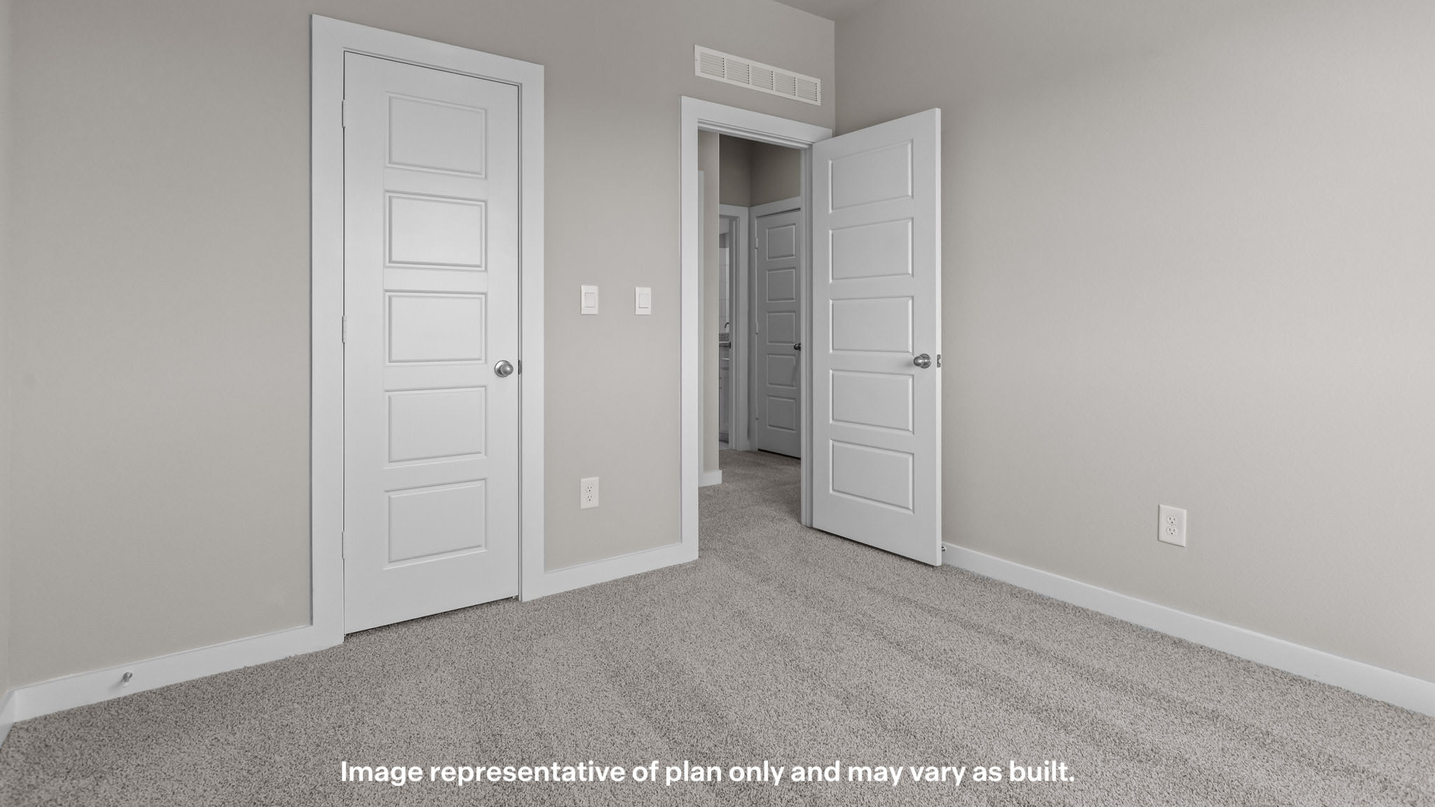 Upstairs guest bedroom 3 with plush carpet floors and side window
