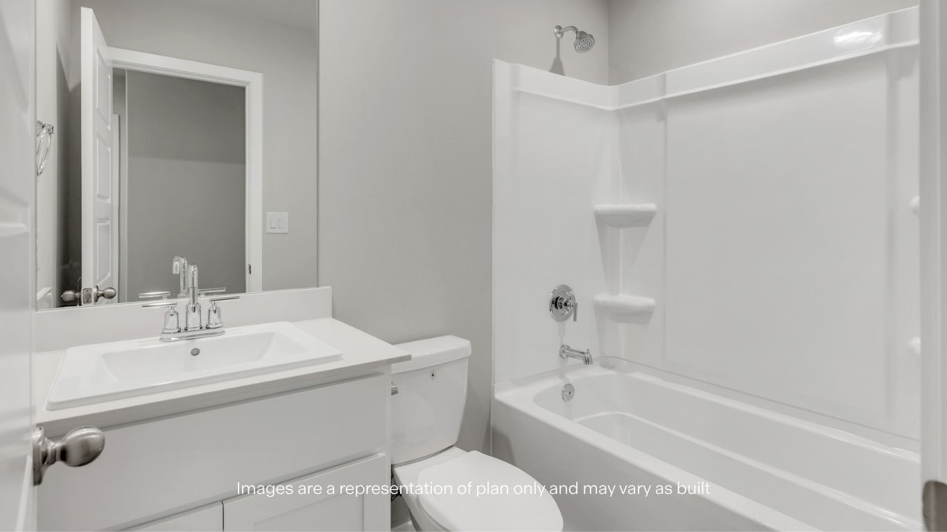 Full secondary bathroom featuring a vanity, tub/shower combination, and modern fixtures.