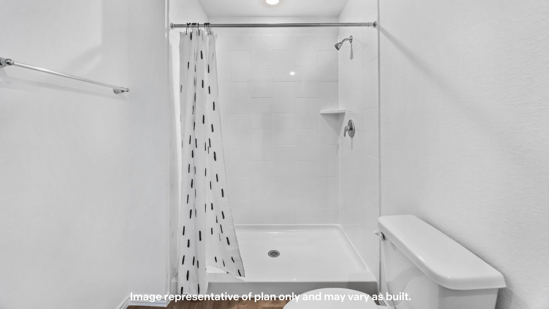 Primary bathroom with luxurious shower and built in storage