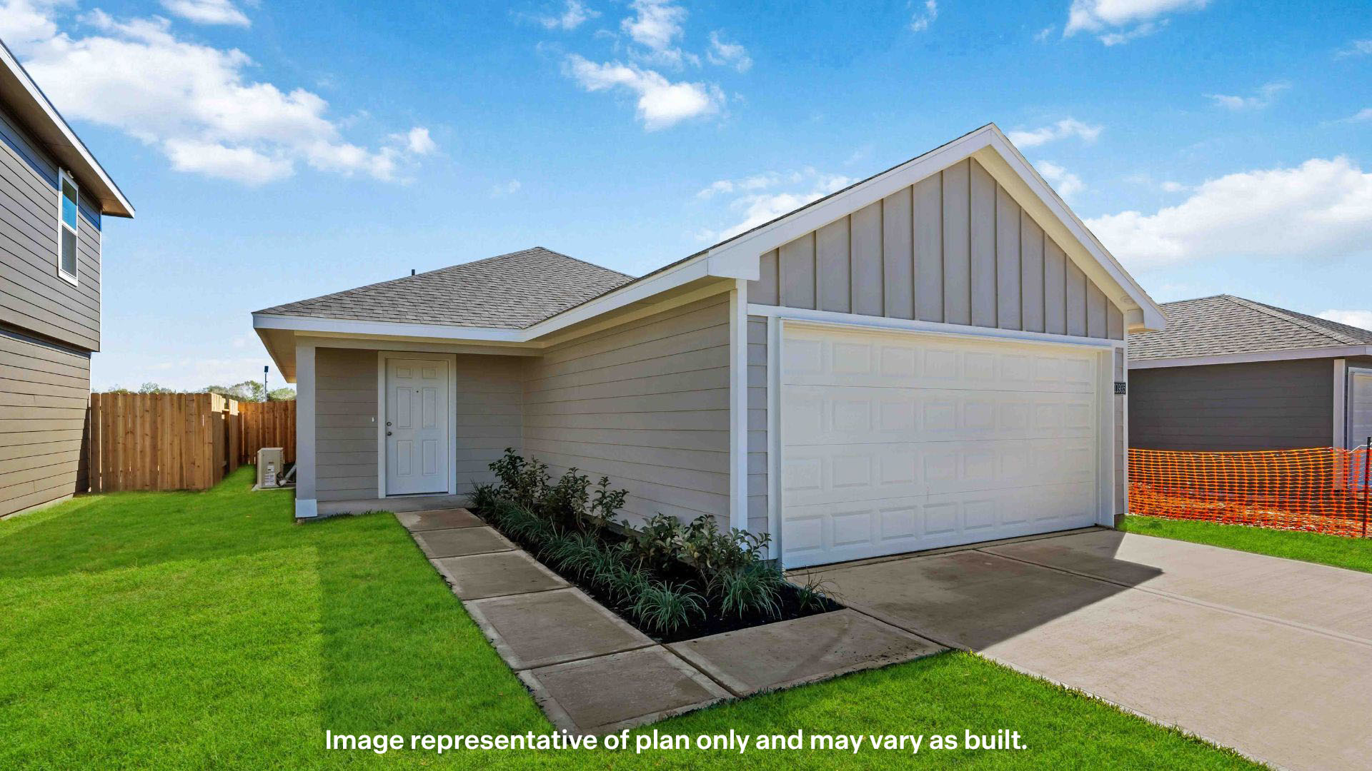 Exterior photo of single story home with sturdy siding exterior featuring timeless brick accents